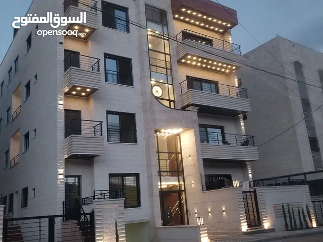 شقة مع رووف( ابو علندا قرب دوار البنزين)مساحة 170متر