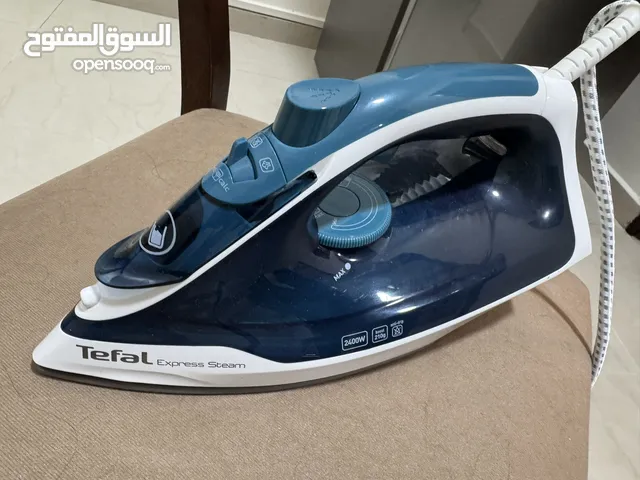 مكواية وميزان