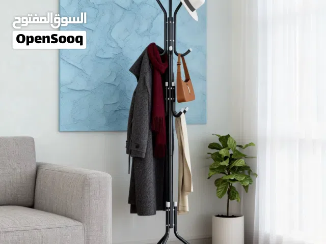 تعلاكة ملابس بقاعدة ثلاثية