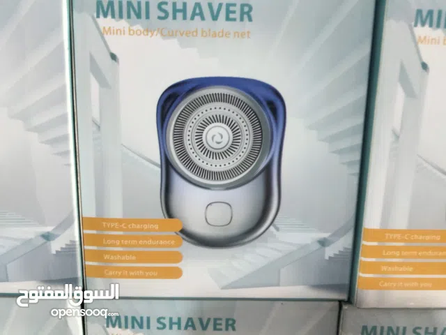 ماكينة حلاقة محمولة وصغيرة لحلاقة الذقن. الرقبة. الشارب. الزوايا والتشذيب الخفيف