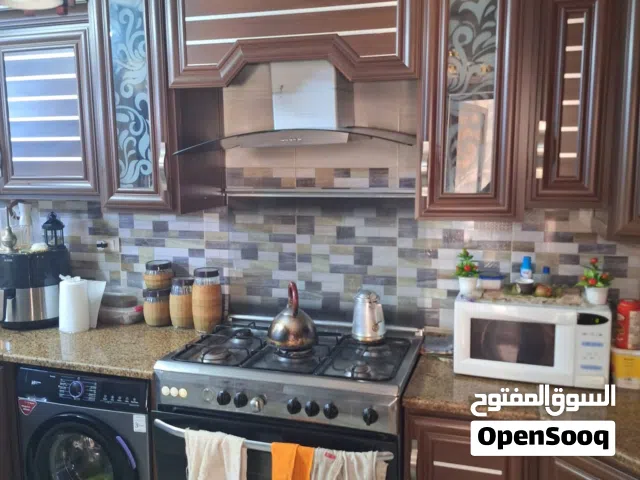 شقه ارضيه للبيع الزرقاء الجديده