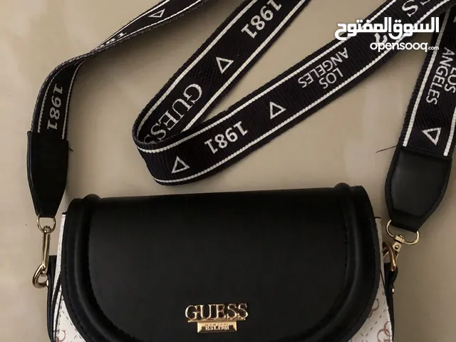 women's bag by Guess, new, price 30 dinars