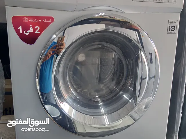 غساله + نشافه نوع LG استوك حجم 8 كيلو غسيل + 4 كيلو تنشيف 1400دوره انفيرتر لون سلفر بحاله ممتازه