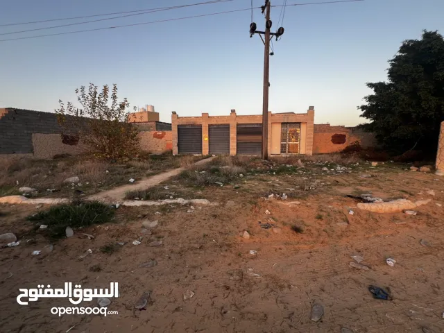 ارض علي الطريق بلقرب مسجد الرحمة تاجوراء