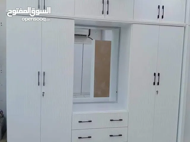 Big cupboard and bed with mattress and dressing table and sofa, bedroom set and dining table selling