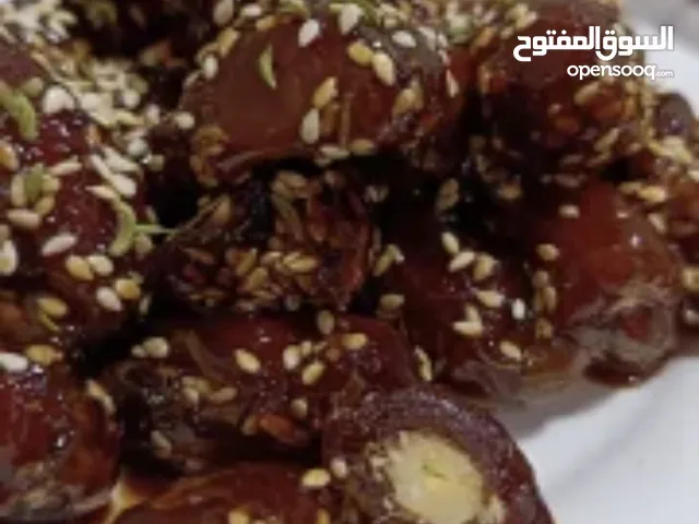 معسل تمر البرحي الفاخر  المحشي بالجوز اومعسل تمر  الخضراوي  المحشي بالجوز مع اضافه للمطيبات