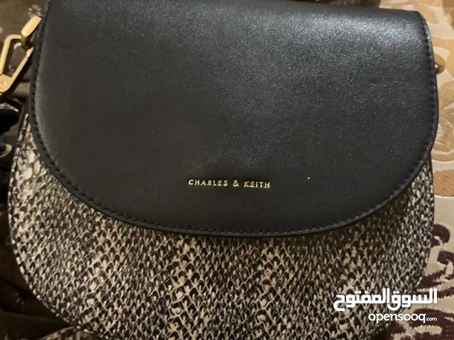 Charlis and kith bag with another origenal bags