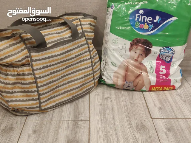 fine baby diapers size 6 for 4.5 kd , All toys 3 kd , Formula milk bag 2 kd , baby 2 pair 3 kd