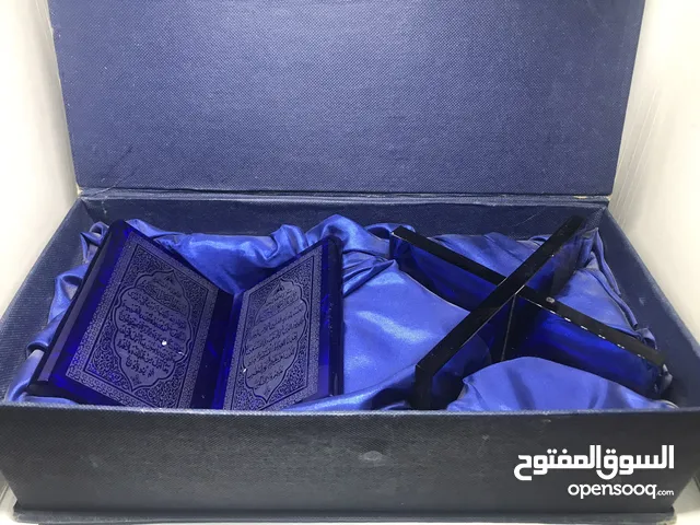 قطعه زجاجيه على هيئه مصحف
