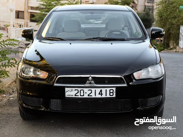 ميتسوبيشي لانسر 2016 ممشى 59 الف كيلو فحص كامل سبعة جيد ولا ملاحظة