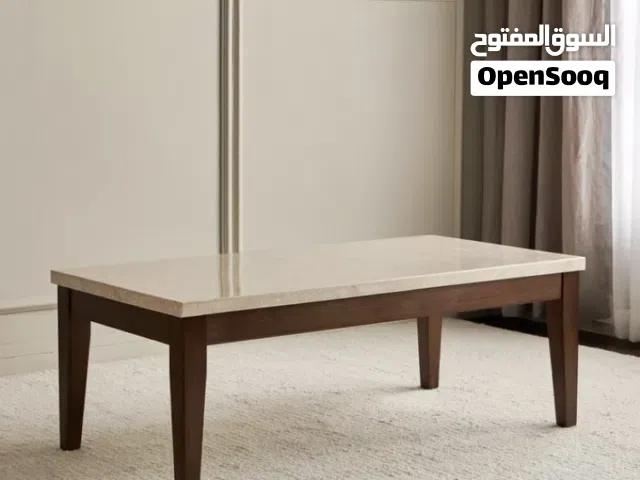 طاولة رخام بحالة شبه جديده من هوم سنتر