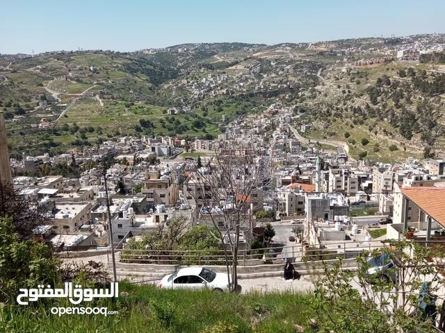 ارض للبدل على منزل وادي السير