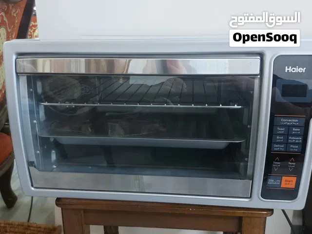 فرن كهربائي ديجيتال Haier بحالة الوكالة ونظيف جداً (مع مروحة وشواية)