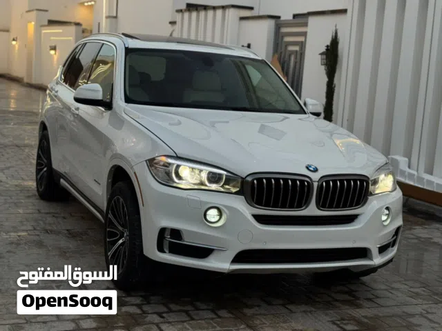 Bmw x5 2015 جمرك سليمه زواق الدار خبش لا لون خارجي ابيض وداخلية ببضاء فل اوبشن رقم واحد ربي يبارك