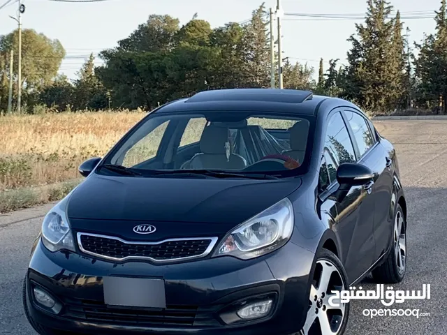 كيا ريو 2013 لون فيراني فحص كامل فل كامل مع فتحة