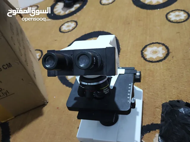 ميكروسكوب MD  و حضانة