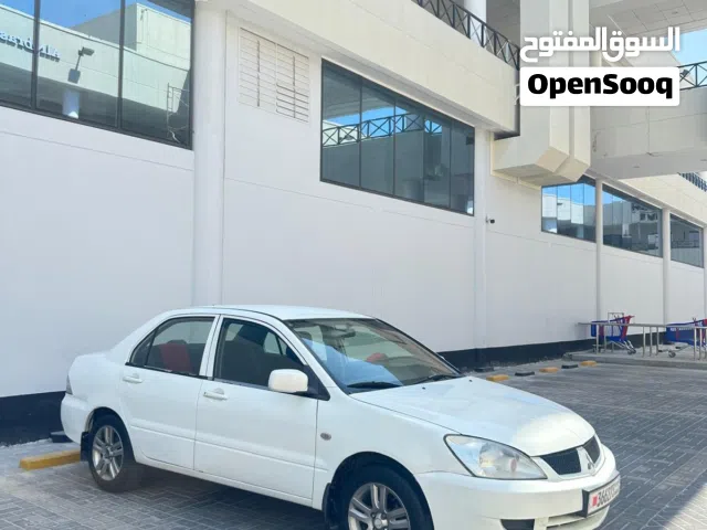 Lancer for sale model 2010 price 1100 negotiable come and check the car