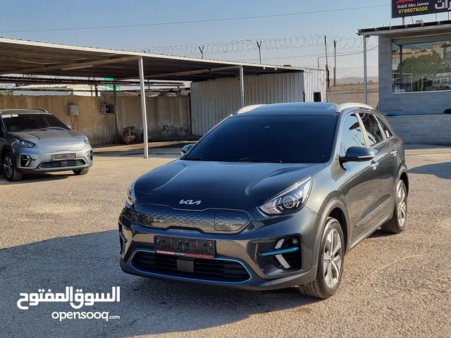 كيا نيرو 2022 فل مع فتحة بحالة الوكالة 7جيد