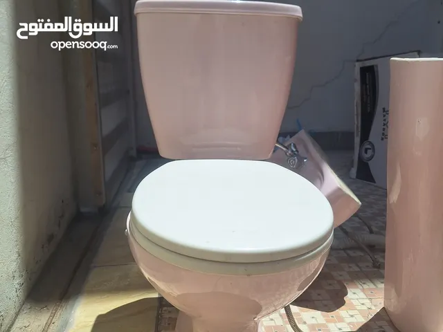 سيت حمام تواليت مع الخزان ومغسلة والملحقات