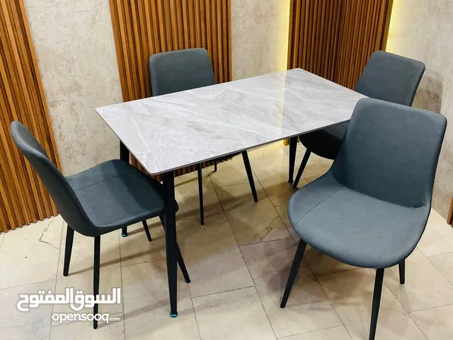 ميز طعام 6 كرسي رجل حديد سطح رخام مزجج قياس الميز 80*140 سم