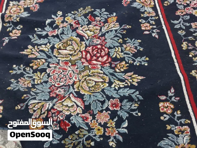 سجادة النساجون صوف 100% بحالة ممتازة