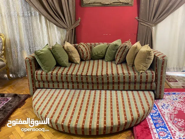 كنبة دريم 2 في 1 تتحول لسرير دائري تصميم ملكي يجمع بين الأناقة والعملية الحل الذكي للمساحات الأنيقة