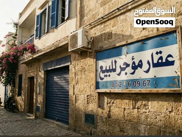 فيلا مؤجرة مدرسة + قطعة ارض بها انتينا ليبيانا