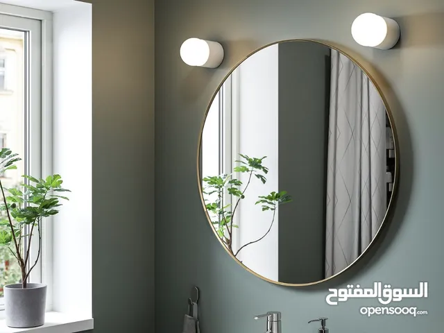 مرآه ذهبي من ايكيا .