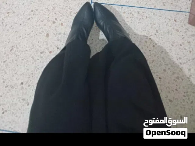 Bottes femmes noirs avec talons