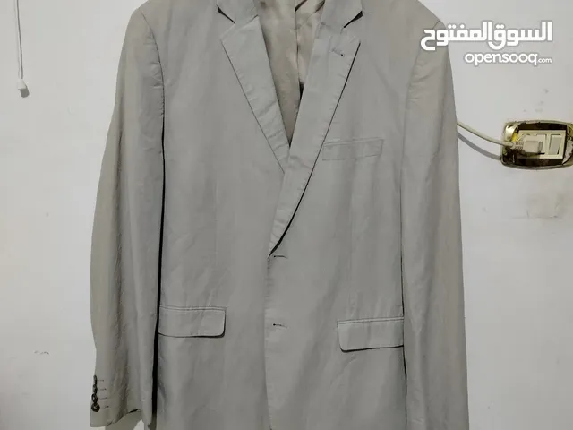 بليزر من الإمارات جديد زيرو لون بيچ مقاس 54