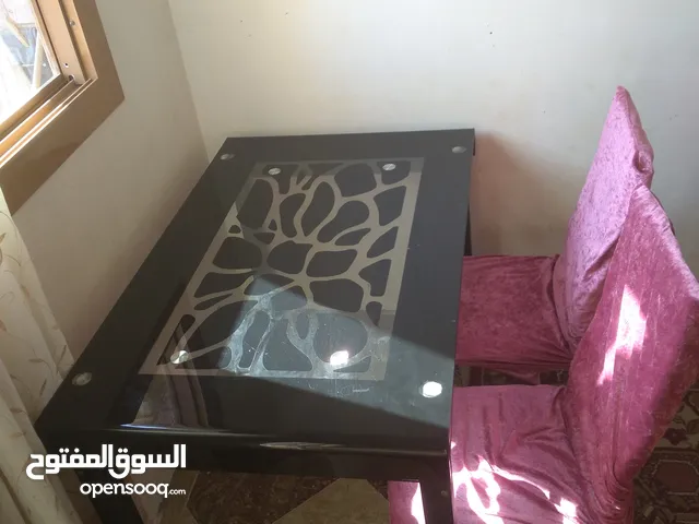 ترابيزه سفره الوميتال بزجاج فاميه مدعمه بجوانب استالس وريجلاش للرجول للبيع لعدم الاستخدام