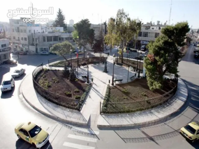 عمارة تجارية للبيع جبل اللويبدة بسعر مغري