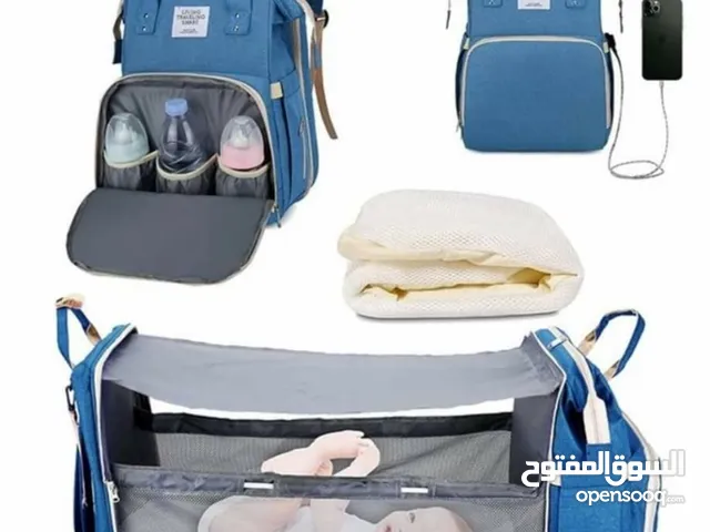 حقيبة ظهر الام مع سرير للاطفال 2×1
