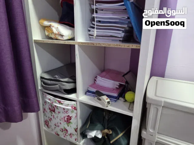 shelf for storing books games clothes