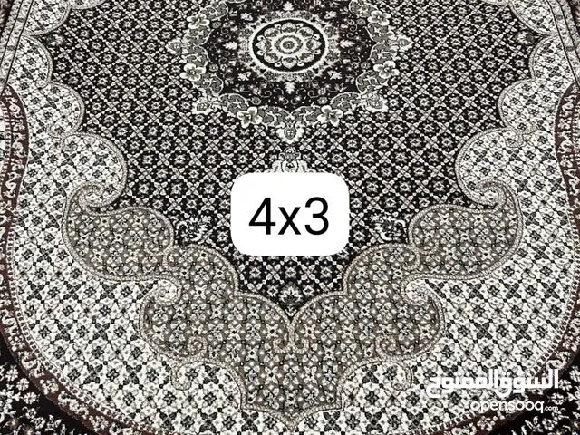 كنب وسجادات وطاوله