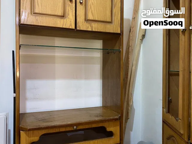 بوفيه ثلاث قطع وكنبة مستعمليين