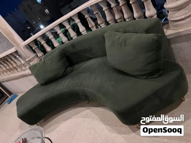 كنب منحني مع مرجيحة