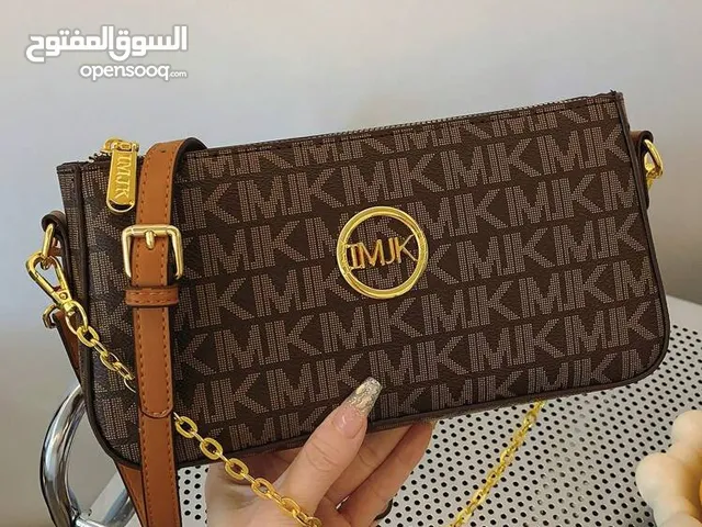 brown Michael Kors for sale in Tripoli