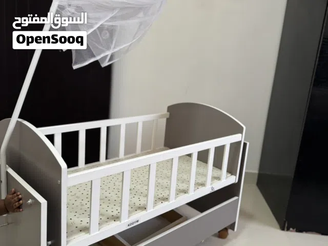 Wooden bay cot (cradle) with mosquito net