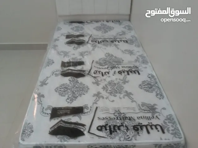singles size bed with mattress available medicated mattress and spring mattress available