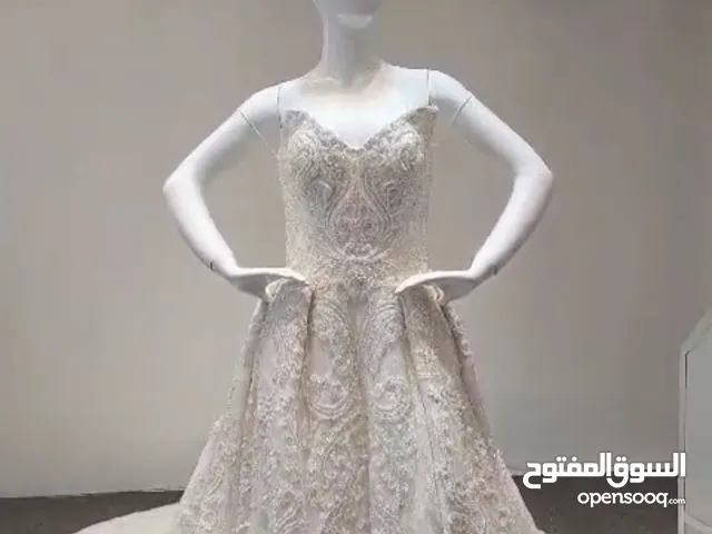 فستان عروس ابيض