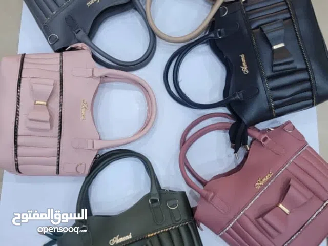 أبو مجد للجميع الشنط النسائي والشبابي باأحدث الموديلات