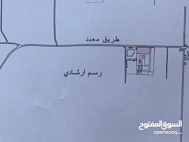نص هكتار للببع عالطريق الرئيسي عين زارة بالقرب من مدرسة جابر بن حيان