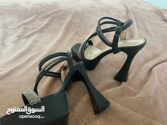 Black With Heels in Amman