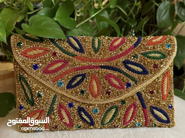 حقيبة مسكة نسائية