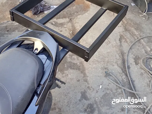 قاعدة شنطة سكوتر