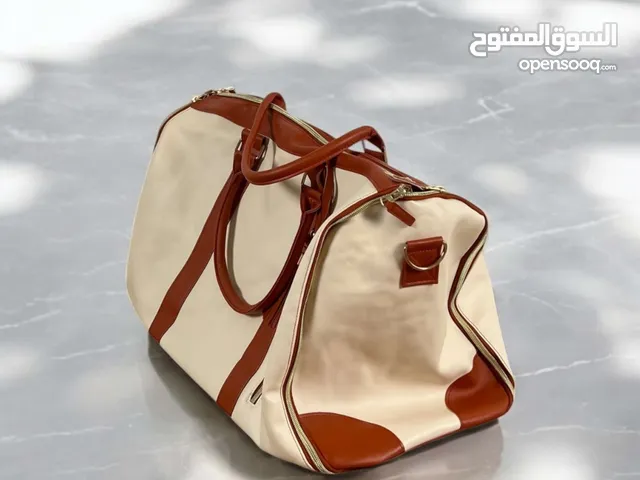 حقيبة سفر بينترست الجلدية بثلاث الوان: بيج_وردي_اسود