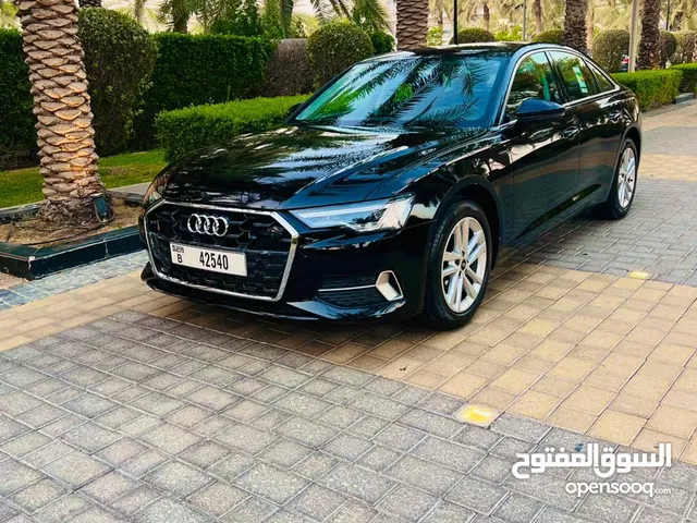 Audi A6 model 2024 black with screen سيارة اودي A6 موديل حديث بها شاشة ومثبت سرعة وتقنيات حديثة