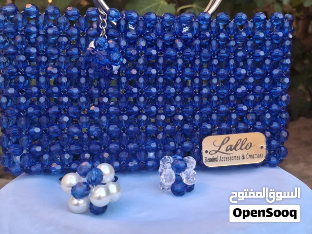 شنط كريستال واللولي لتميز اطلالتك