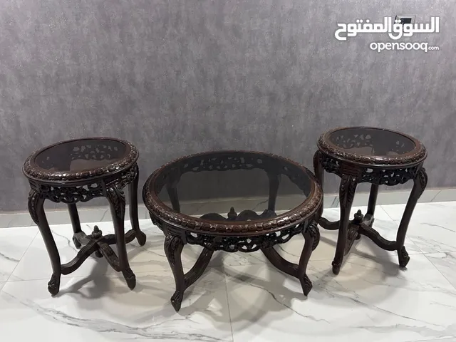Round table and two side tables
